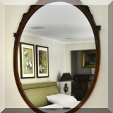 D14. Oval wooden mirror. 38”h x 30”w 